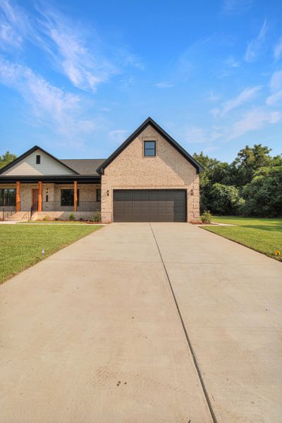Front exterior of a new home in , Orangeburg, SC, highlighting curb appeal (Image 17).