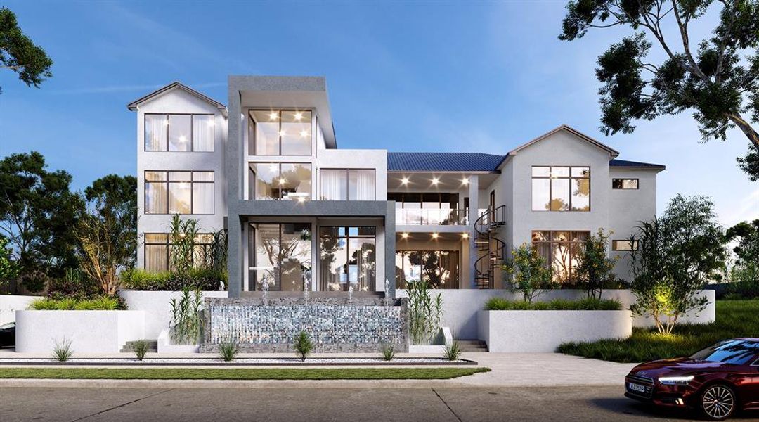 Modern home featuring stucco siding, a balcony, stairs, and a fenced front yard