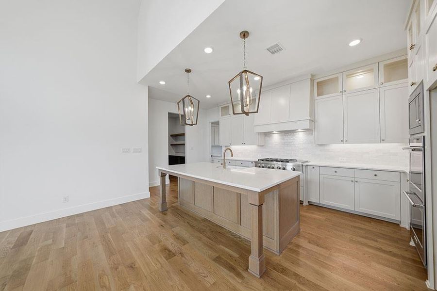 Furnished interior view inside a new home in Light Farms Graham/Reagan, Celina (Image 14).