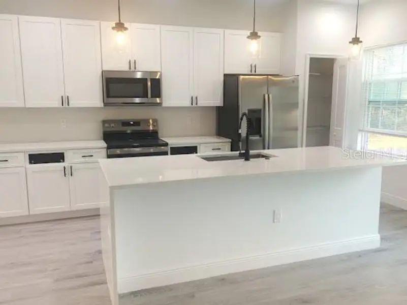 Furnished interior view inside a new home in , Ocala (Image 4).