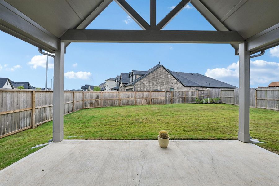 Large covered patio with cathedral ceiling