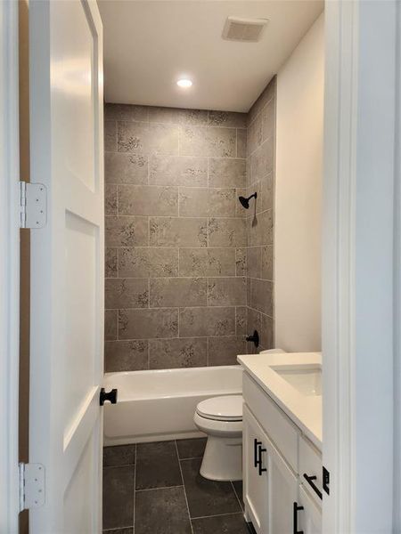 Full bath with vanity, bathing tub / shower combination, and recessed lighting Full bath with vanity, bathing tub / shower combination, and recessed lighting