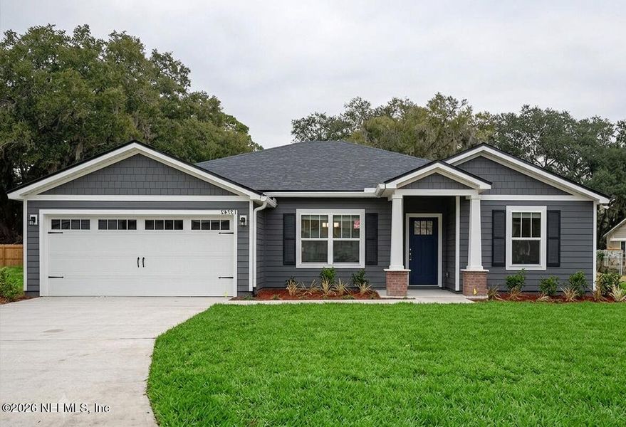Front exterior of a new home in , Jacksonville, FL, highlighting curb appeal (Image 1). Front exterior of a new home in , Jacksonville, FL, highlighting curb appeal (Image 1).