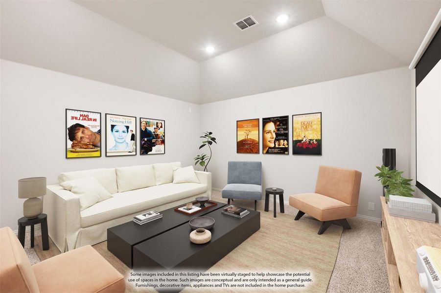 Media room with white sofa, projection screen, and movie poster wall art on neutral walls Media room with white sofa, projection screen, and movie poster wall art on neutral walls