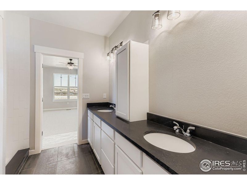 Furnished interior view inside a new home in Barefoot Lakes, Firestone (Image 6).