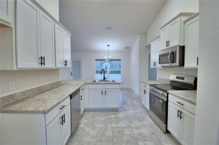 Furnished interior view inside a new home in Cadence Crossing, Auburndale (Image 11). Furnished interior view inside a new home in Cadence Crossing, Auburndale (Image 11).