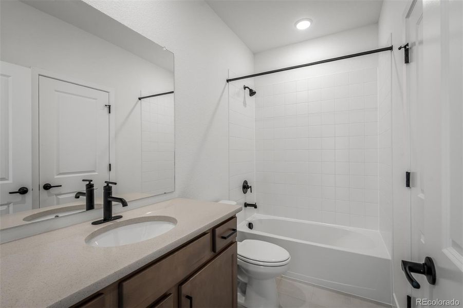 Furnished interior view inside a new home in Revel Crossing at Wolf Ranch – The Outlook Collection, Colorado Springs (Image 18).