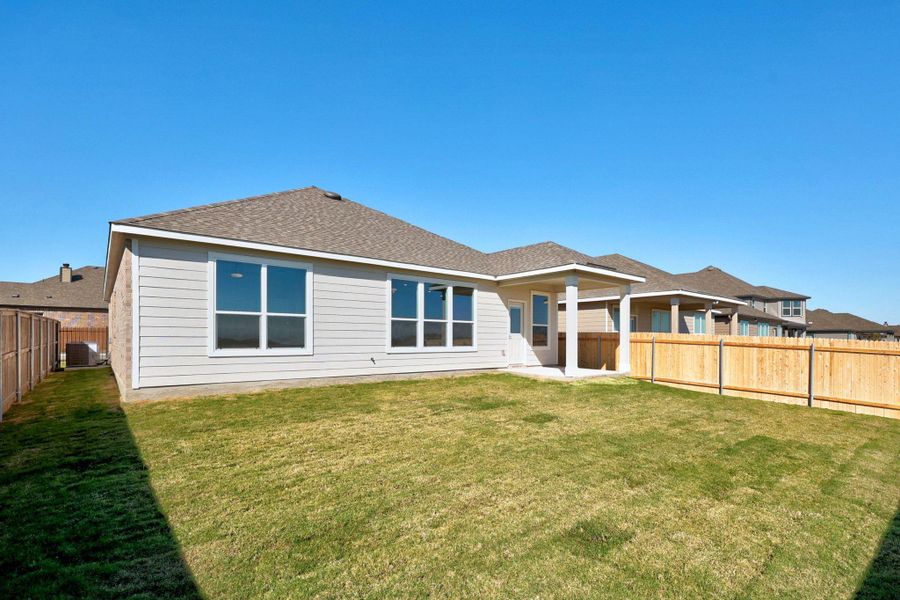 Exterior details and patio area of a home in McKinney Crossing, Austin (Image 20). Exterior details and patio area of a home in McKinney Crossing, Austin (Image 20).
