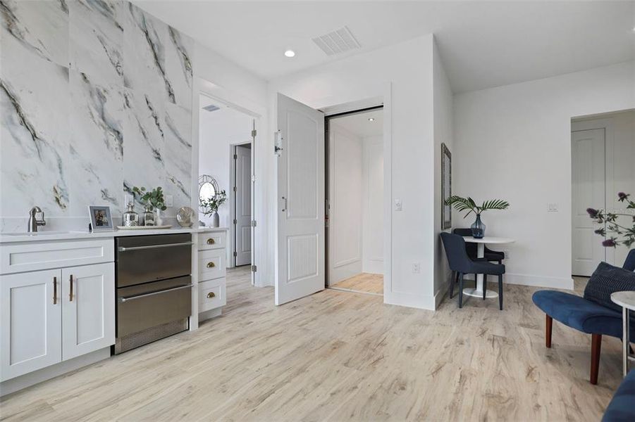 Sitting Area on 3rd Floor - Primary Bedroom Mini Bar with Bar sink, wine cooler and Wine Boss double drawer refrigerator