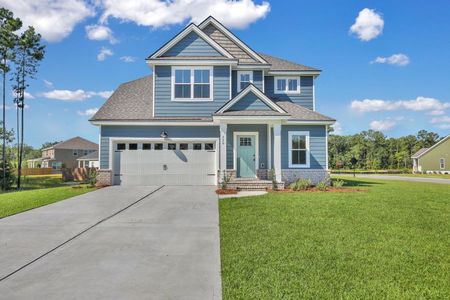 Representative exterior photo of a completed home built from the Sherwood by Ernest Homes in Wexford, Richmond Hill, GA (Image 29).