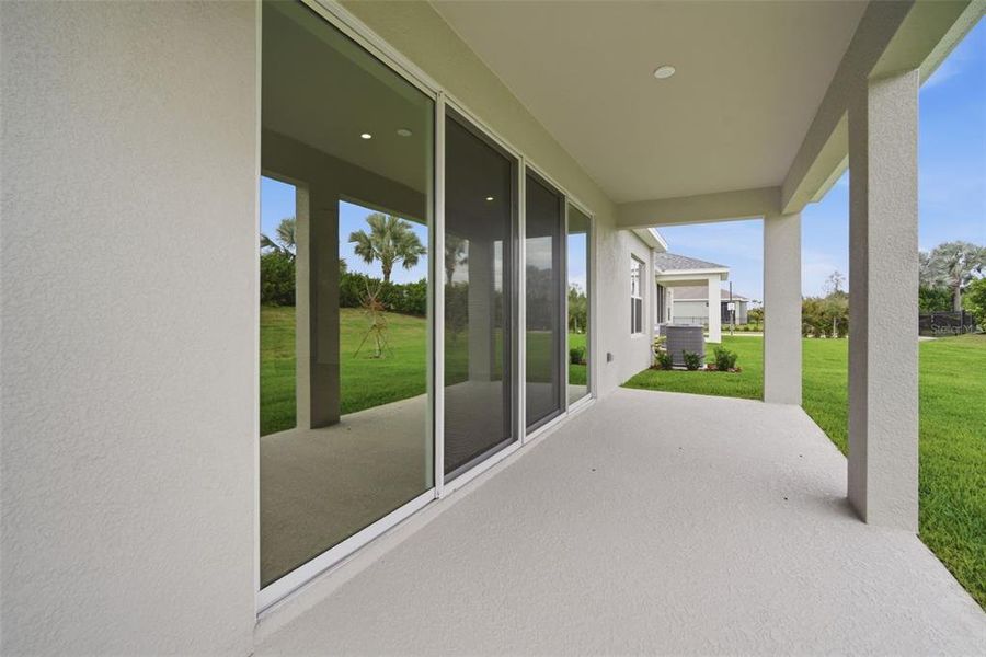 Exterior details and patio area of a home in North River Ranch, Parrish (Image 26).