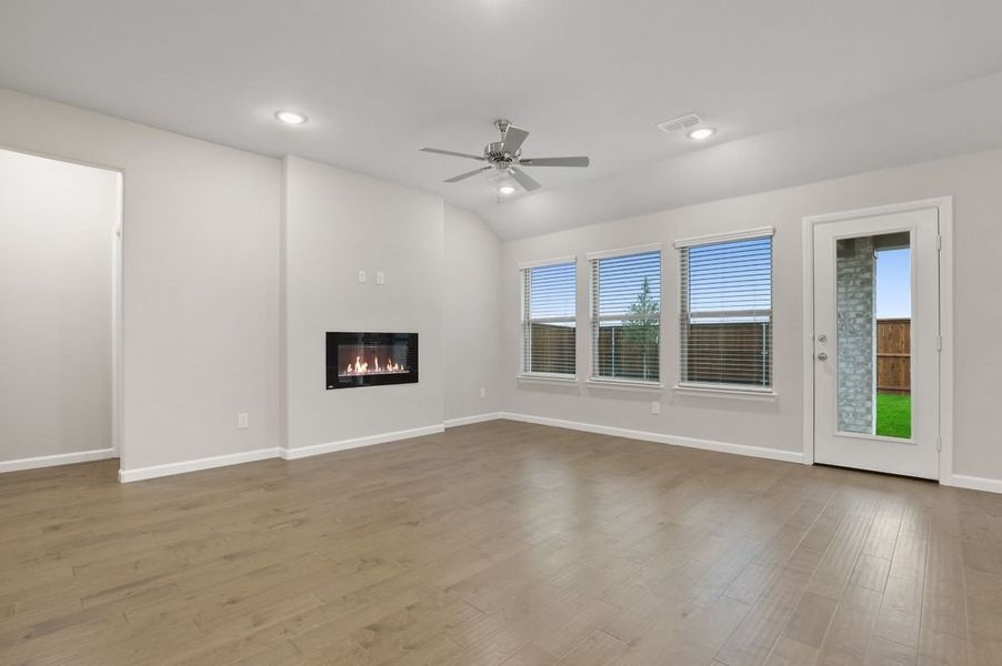 Living room in the Pulitzer home plan by Trophy Signature Homes – REPRESENTATIVE PHOTO