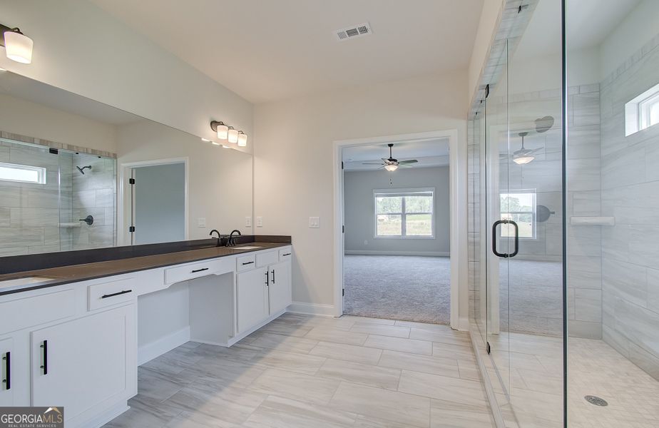 Furnished interior view inside a new home in Rosewood Lake Preserve, Hoschton (Image 14). Furnished interior view inside a new home in Rosewood Lake Preserve, Hoschton (Image 14).