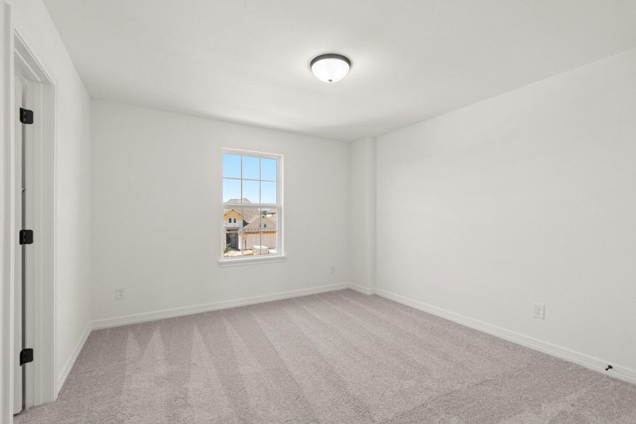 Your secondary bedroom features plush carpet, fresh paint, closet, and a large window that lets in plenty of natural lighting. Your secondary bedroom features plush carpet, fresh paint, closet, and a large window that lets in plenty of natural lighting.