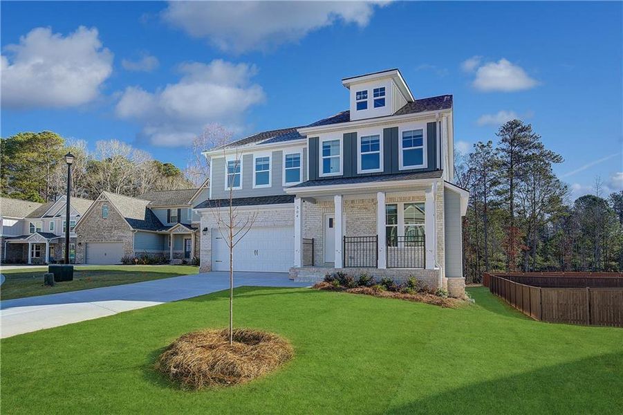 Front exterior of a new home in Kingston, Locust Grove, GA, highlighting curb appeal (Image 17). Front exterior of a new home in Kingston, Locust Grove, GA, highlighting curb appeal (Image 17).