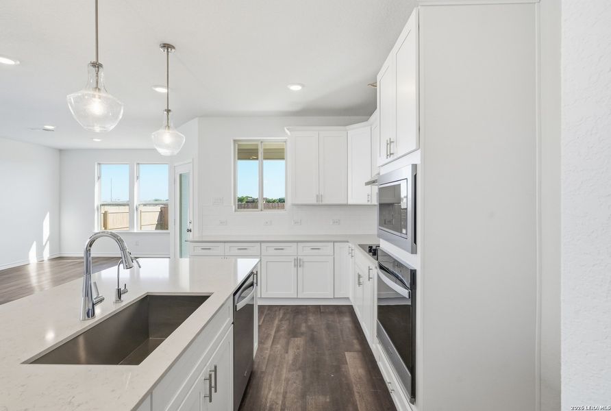 Furnished interior view inside a new home in Nopal Valley, San Antonio (Image 8).