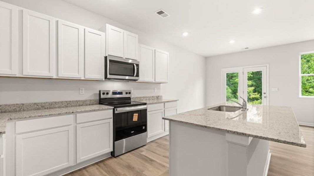 Furnished interior view inside a new home in Oconee Overlook Townhomes, Gainesville (Image 8).