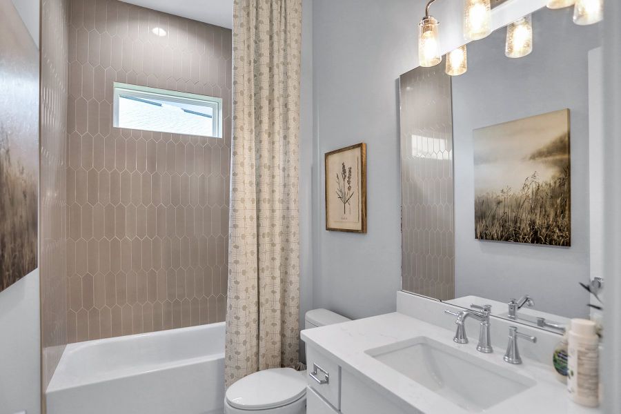 Representative furnished interior of a home built from the Lola - Hidden Creek by MasterCraft Builder Group in SilverLeaf, St. Augustine (Image 28).