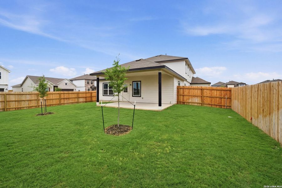 Exterior details and patio area of a home in Hennersby Hollow, San Antonio (Image 3).