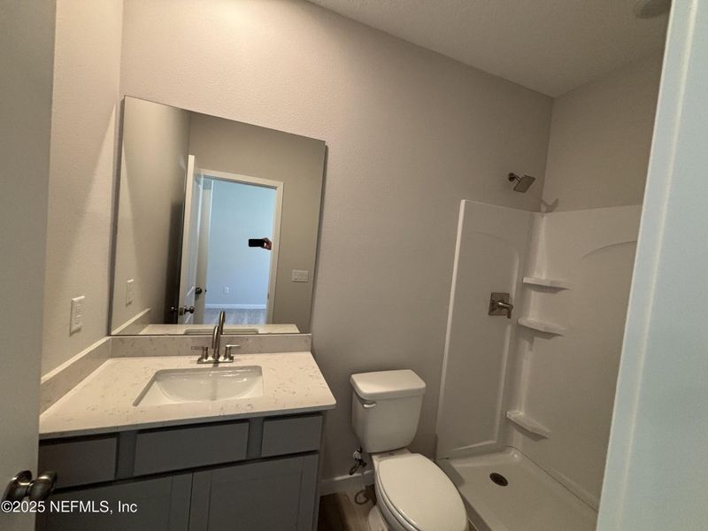 Furnished interior view inside a new home in The Magnolia Series at Reserve East, Flagler Beach (Image 6).