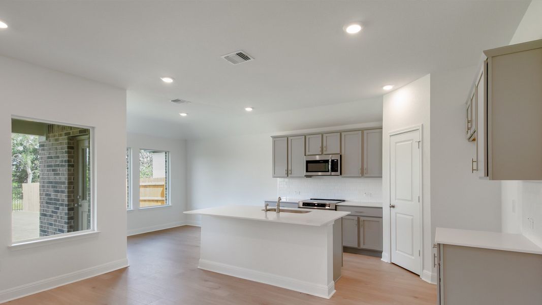 Representative furnished interior of a home built from the The Alvin by D.R. Horton in Riverview, Georgetown (Image 5).