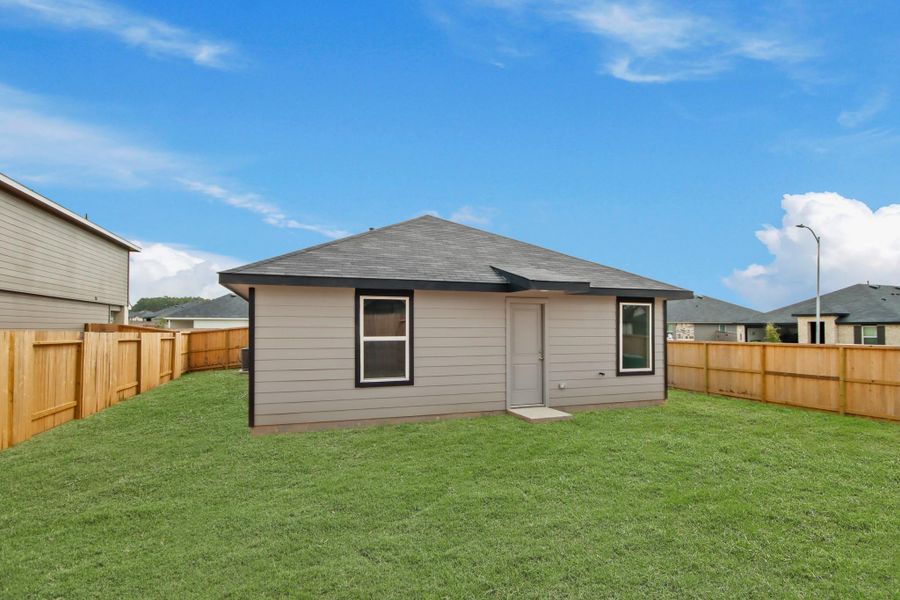 Exterior details and patio area of a home in Mill Creek, Magnolia (Image 3). Exterior details and patio area of a home in Mill Creek, Magnolia (Image 3).
