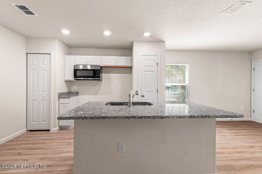 Furnished interior view inside a new home in , Jacksonville (Image 6).
