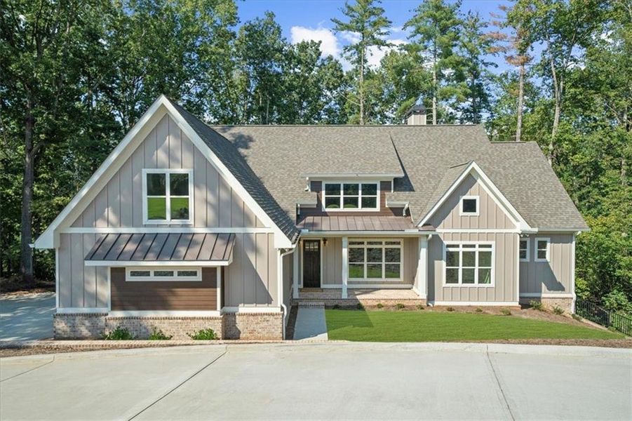 Front exterior of a new home in , Gainesville, GA, highlighting curb appeal (Image 24).