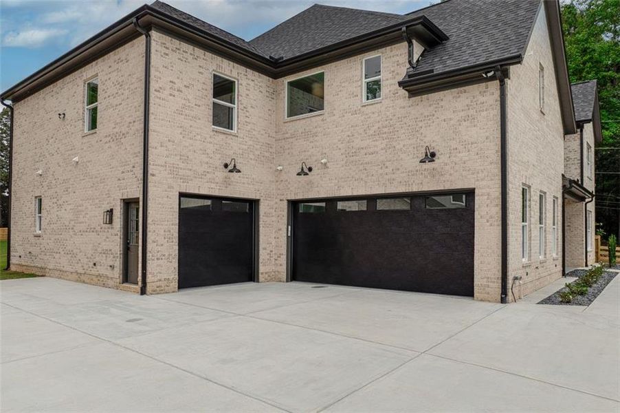 Front exterior of a new home in , Dacula, GA, highlighting curb appeal (Image 26).