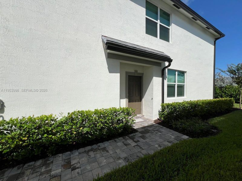 Exterior details and patio area of a home in , Lauderdale Lakes (Image 3).