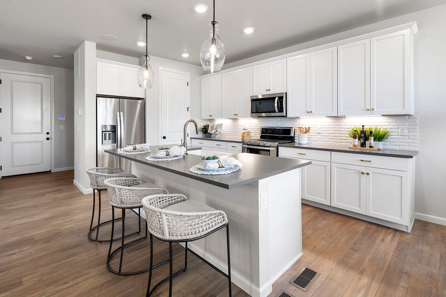 Representative furnished interior of a home built from the 3 by Tri Pointe Homes in Sugar Mill Village, Longmont (Image 17).