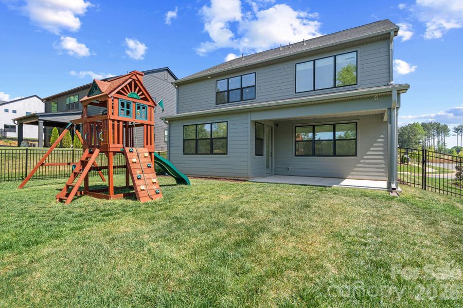 Exterior details and patio area of a home in Amara Chase, Huntersville (Image 3).