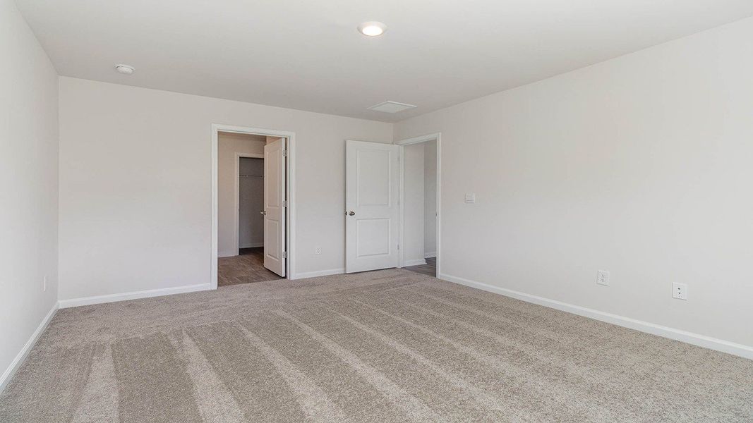 Representative unfurnished interior of a home built from the CALI by D.R. Horton in Heritage Crossing, Conway (Image 12).