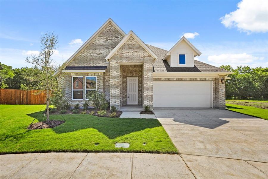 Front exterior of a new home in Lyons Crest Estates, Garland, TX, highlighting curb appeal (Image 1). Front exterior of a new home in Lyons Crest Estates, Garland, TX, highlighting curb appeal (Image 1).
