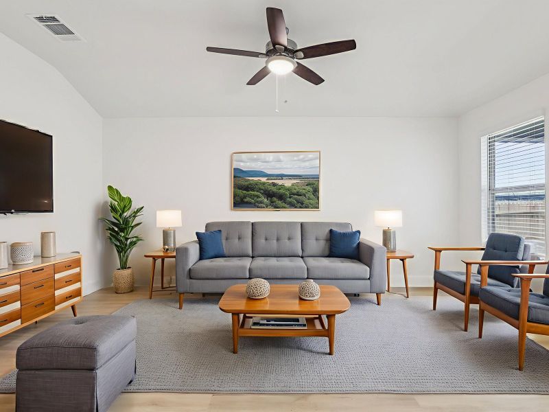 Living room in the Callaghan floorplan at a Meritage Homes community.