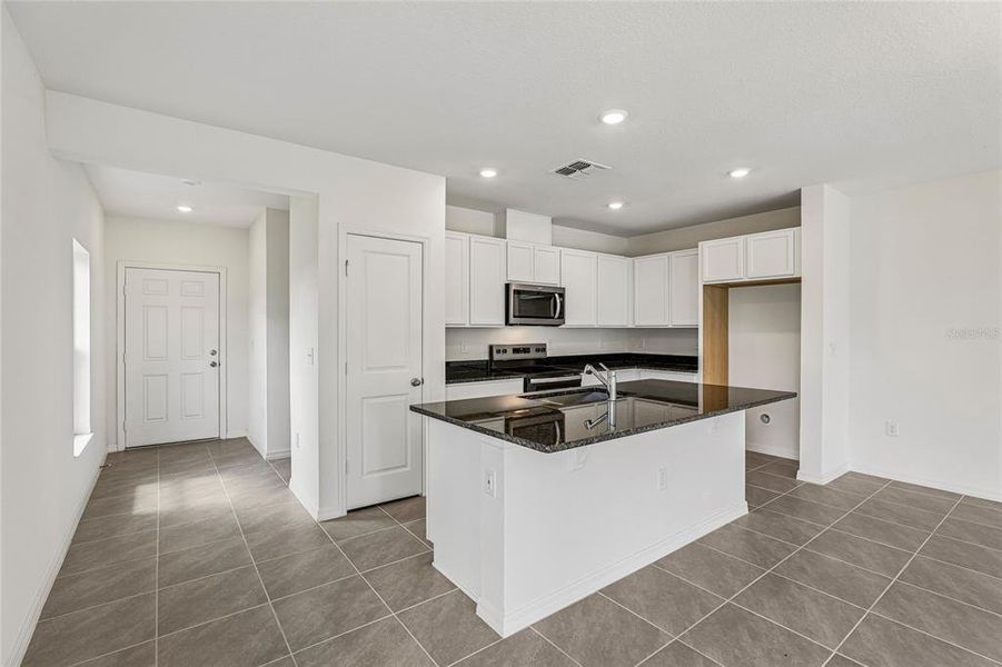 Furnished interior view inside a new home in , Lake Wales (Image 8).