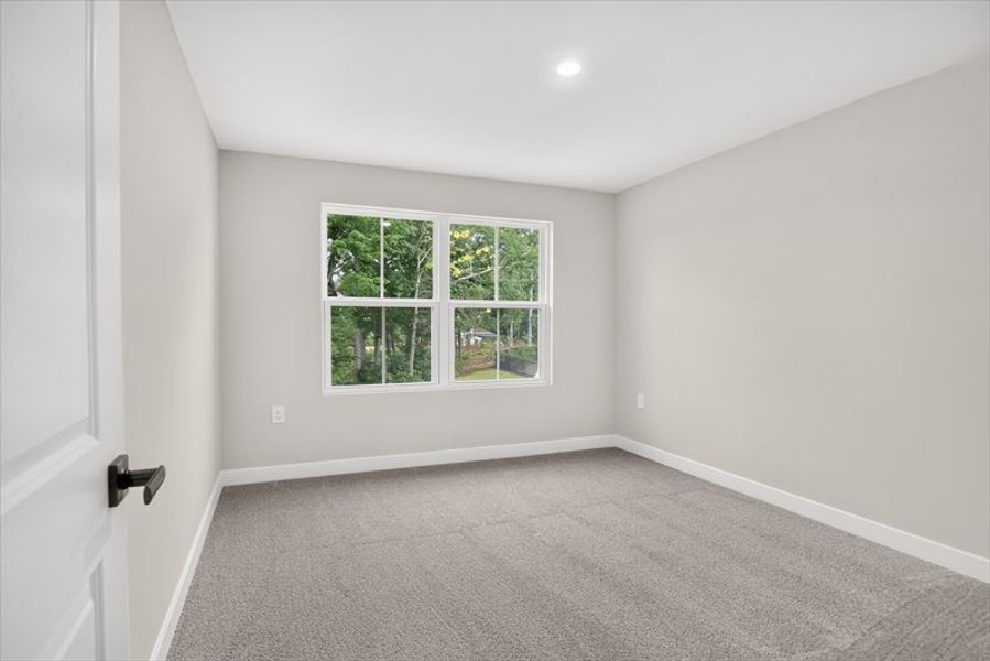 Spacious, unfurnished interior of a new home in Arden Woods, Greenville (Image 17).