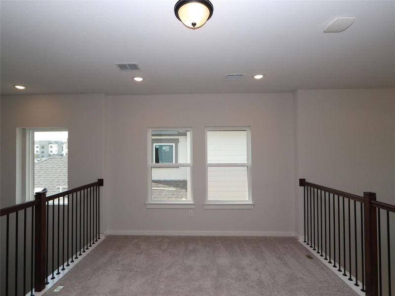 Spacious, unfurnished interior of a new home in Estancia West, Manchaca (Image 14).