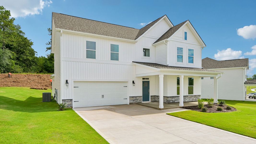 Representative exterior photo of a completed home built from the Hartwell by D.R. Horton in The Manors at Martin Farms, Aberdeen, NC (Image 2). Representative exterior photo of a completed home built from the Hartwell by D.R. Horton in The Manors at Martin Farms, Aberdeen, NC (Image 2).