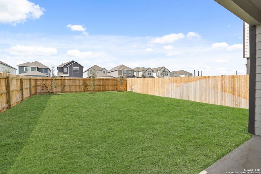 Exterior details and patio area of a home in Melissa Ranch, San Antonio (Image 19).