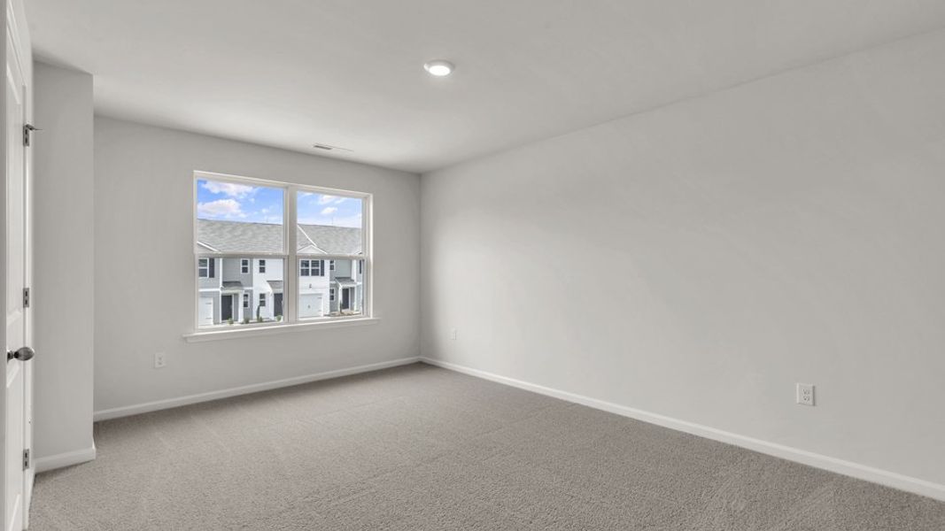 Spacious, unfurnished interior of a new home in The Townes at Wilson's Ridge, Smithfield (Image 20).