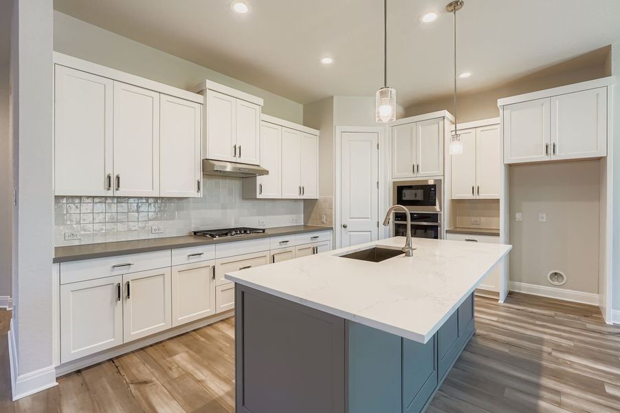 Furnished interior view inside a new home in 6 Creeks, Kyle (Image 3).