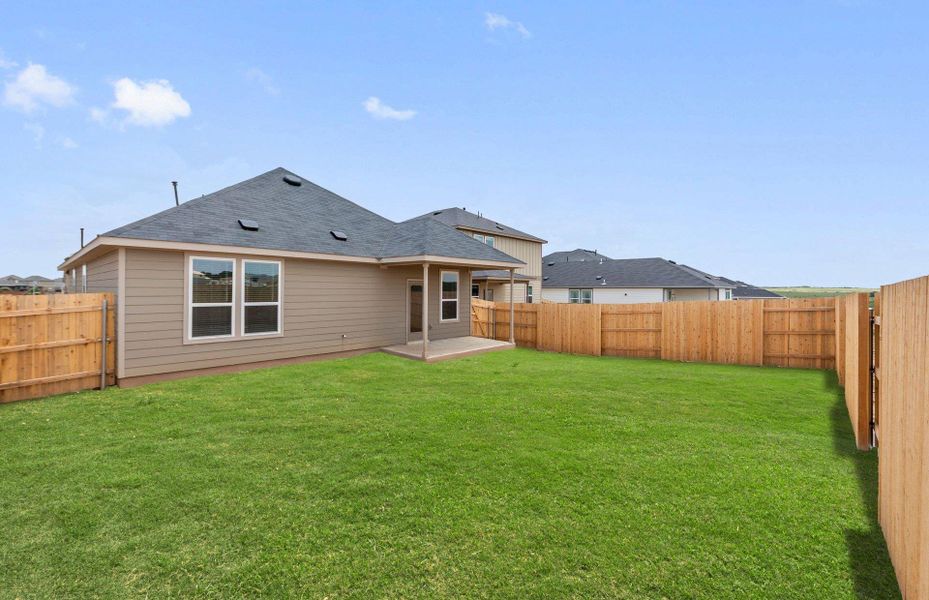 Exterior details and patio area of a home in Sunfield, Buda (Image 20).