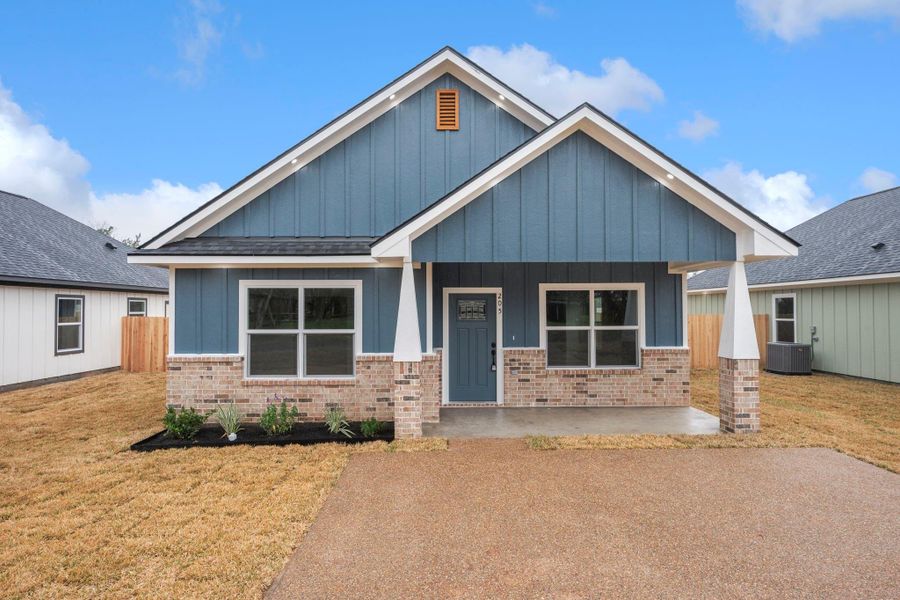 Front exterior of a new home in , Bryan, TX, highlighting curb appeal (Image 2). Front exterior of a new home in , Bryan, TX, highlighting curb appeal (Image 2).