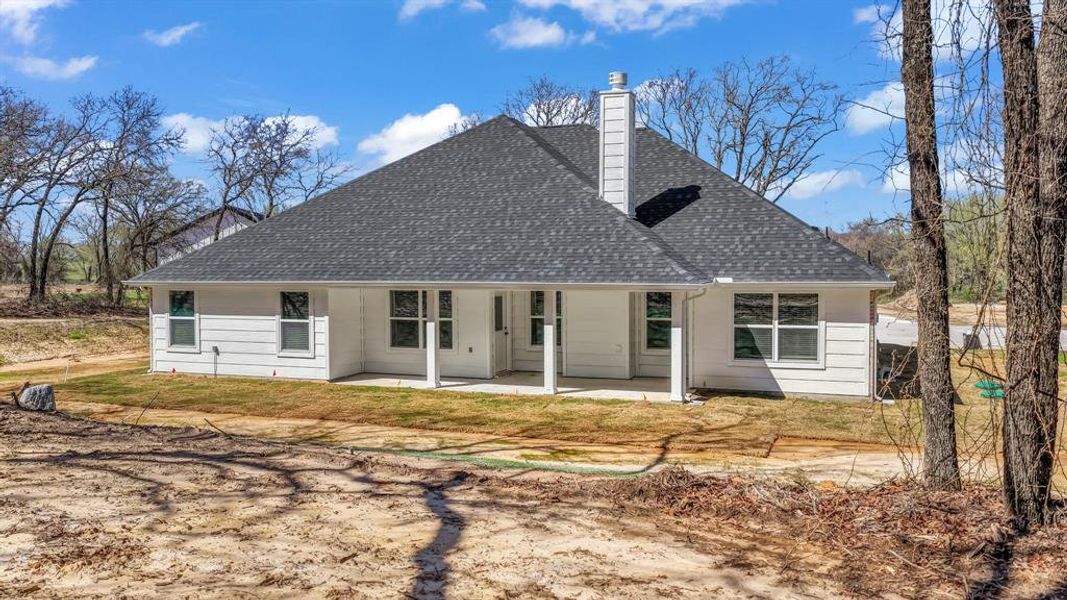 Exterior details and patio area of a home in , Poolville (Image 24).