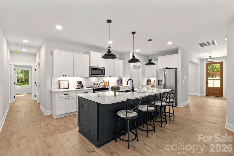 Stainless appliances to include the refrigerator come with home.