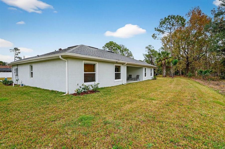 Exterior details and patio area of a home in , Palm Coast (Image 27).