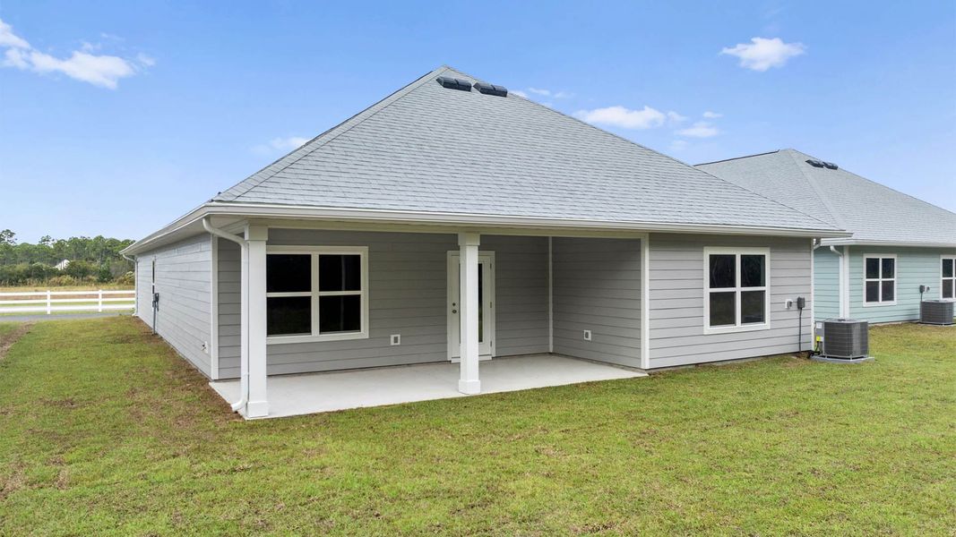 Exterior details and patio area of a home in Buffer Farms, Port Saint Joe (Image 16).
