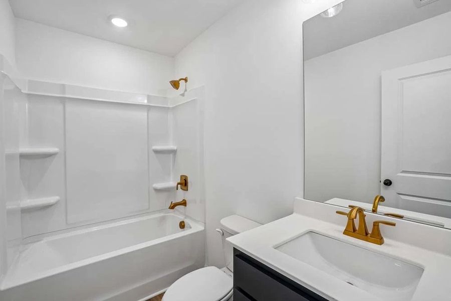 Bathroom Two featuring Luxe Collection Finishes Bathroom Two featuring Luxe Collection Finishes