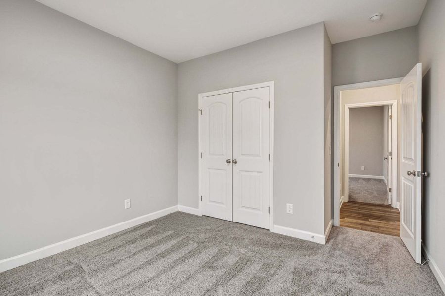 Representative unfurnished interior of a home built from the Garland by Caviness & Cates Communities in Bartlett Manor, Youngsville (Image 238). Representative unfurnished interior of a home built from the Garland by Caviness & Cates Communities in Bartlett Manor, Youngsville (Image 238).